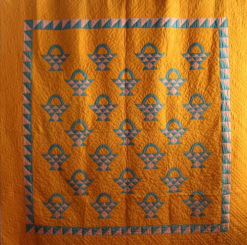 An 1890 Mennonite Basket Quilt with quilted hearts from Lancaster County, PA, 