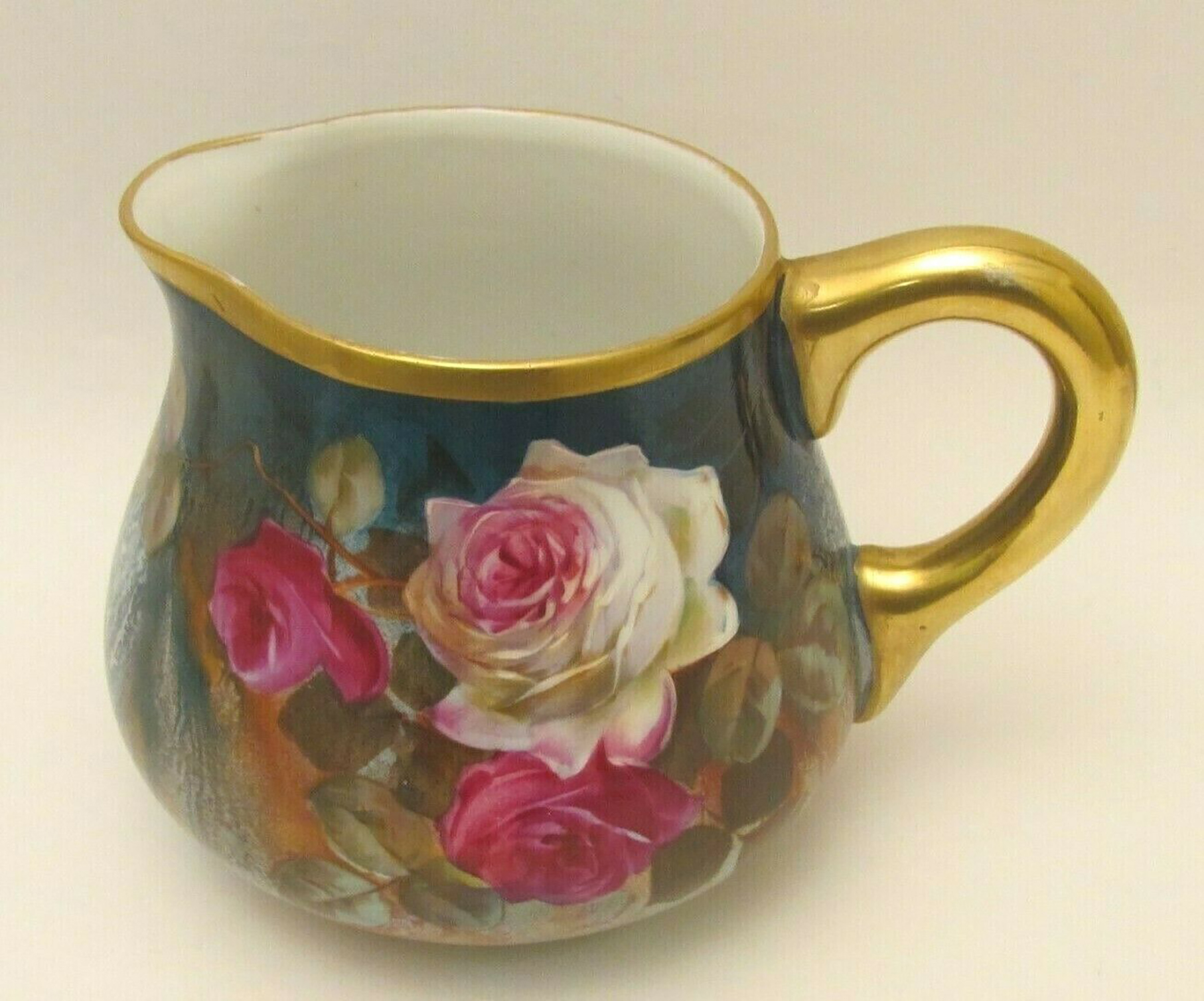 Items similar to this Pickard cider pitcher will be up for bids at an online auction Oct. 9. (Photo courtesy of eBay)