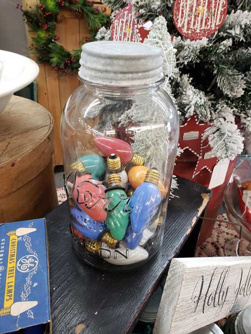 Mason Jar with christmas items like old light bulbs