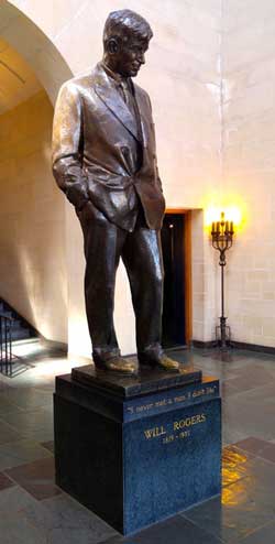 Statue of Will Rogers in rotunda of museum