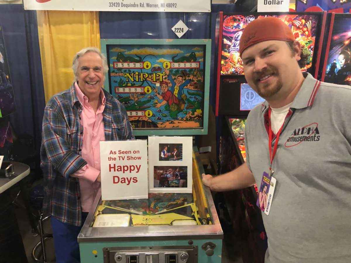 Aaaayyyy! Actor Henry Winkler poses with a Nip-It pinball machine